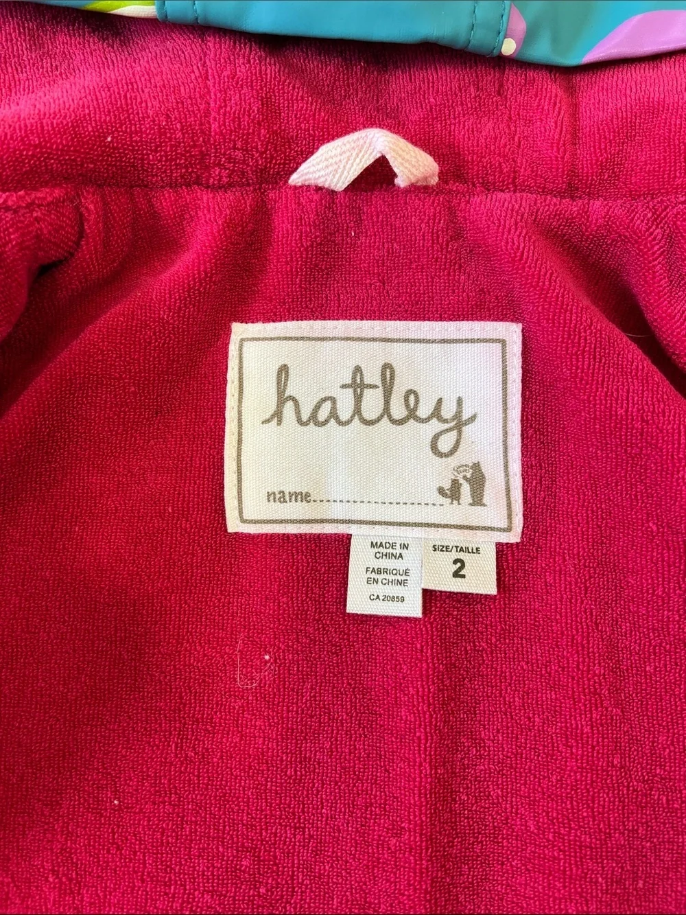Hatley teal apple and worm print hooded raincoat girls 2T lined